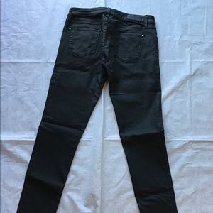Zara Women’s jeans in waxed black.  Slightly shiny